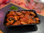 Tajine de poulet au miel, abricots et pruneaux