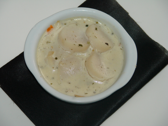 Cassolette de Saint-Jacques aux petits légumes Riesling